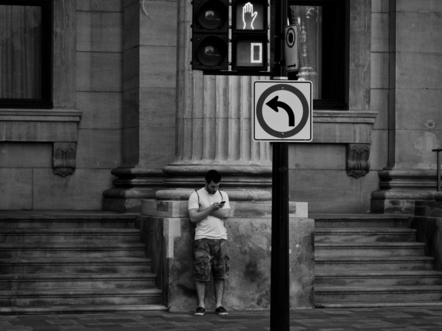 Pedestrian crossing and sign in Montreal.